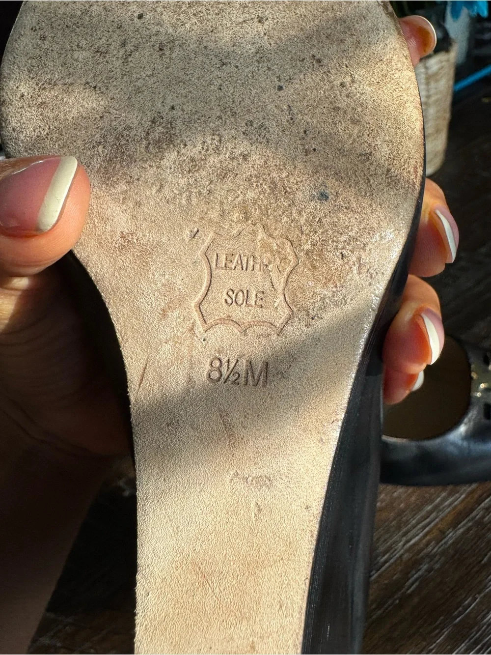 Tory Burch Black Leather Pumps with Gold Logo Accent